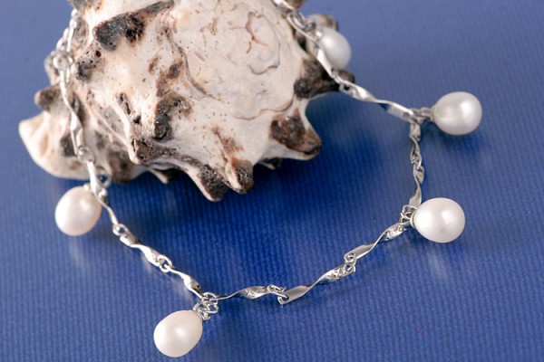 Silberarmband (Spirale) mit echten Süßwasserzuchtperlen Perlen oval ca. 6-8mm - weiß -