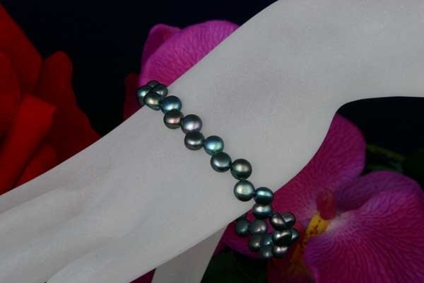 Button Süsswasser Zucht-Perlen-Armband Violett