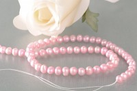 P407 Echter Süßwasser-Perlen-Strang oval 6-7mm 40cm lang offen rosa P407 Echter Süßwasser-Perlen-Strang oval 6-7mm 40cm lang offen rosa